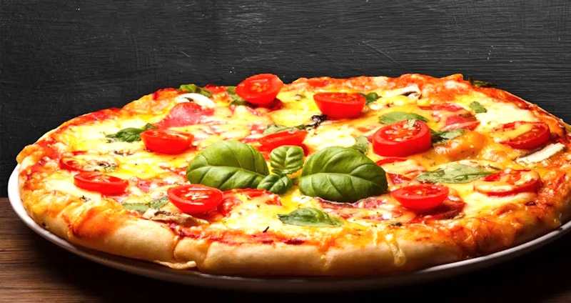 Піца: чи можна насолоджуватися улюбленою стравою без шкоди для самопочуття?